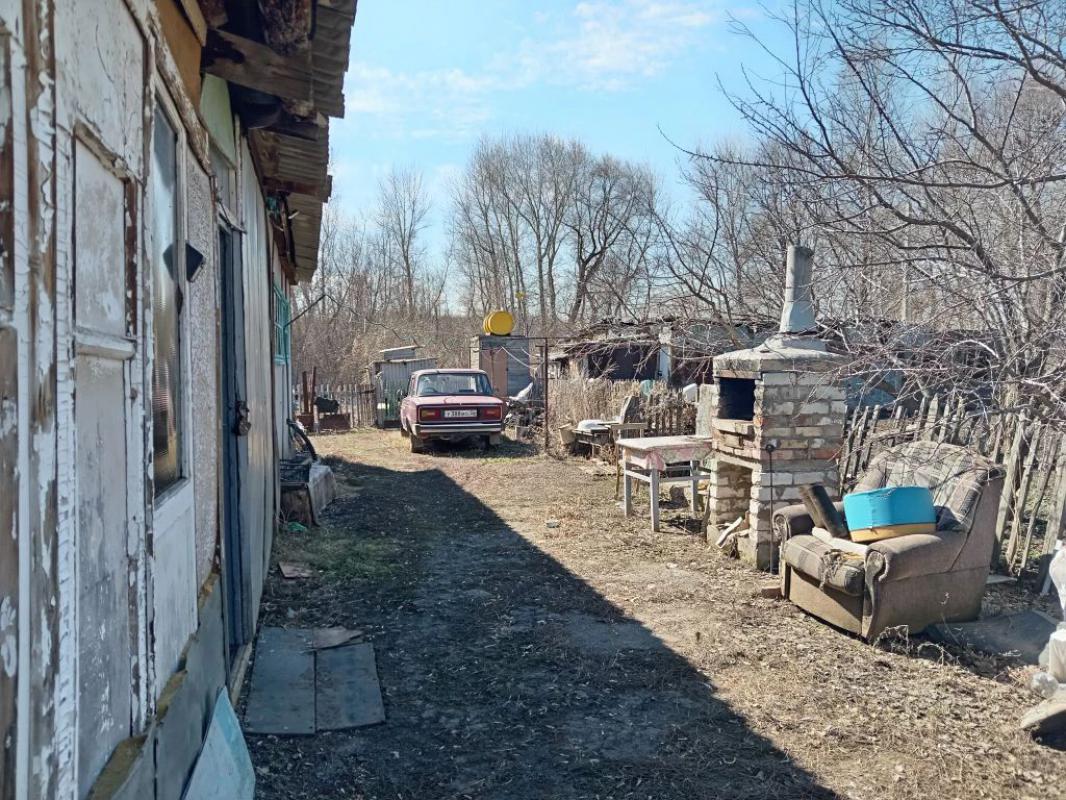 Продам дом (дом на двух хозяев), баня, сарай, большой участок в доме погреб, отопление электр.(380в) - Гай