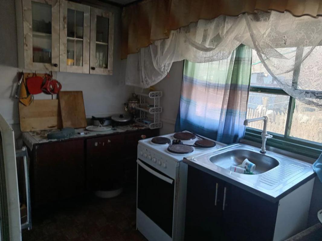 Продам дом (дом на двух хозяев), баня, сарай, большой участок в доме погреб, отопление электр.(380в) - Орск