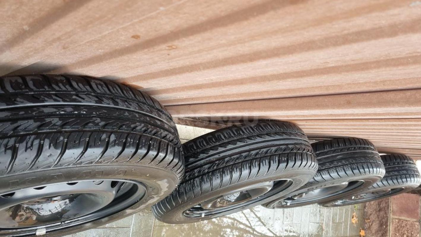 Продам новый комплект летних колес с резиной KAMA BREEZE 175/65R14. - Орск