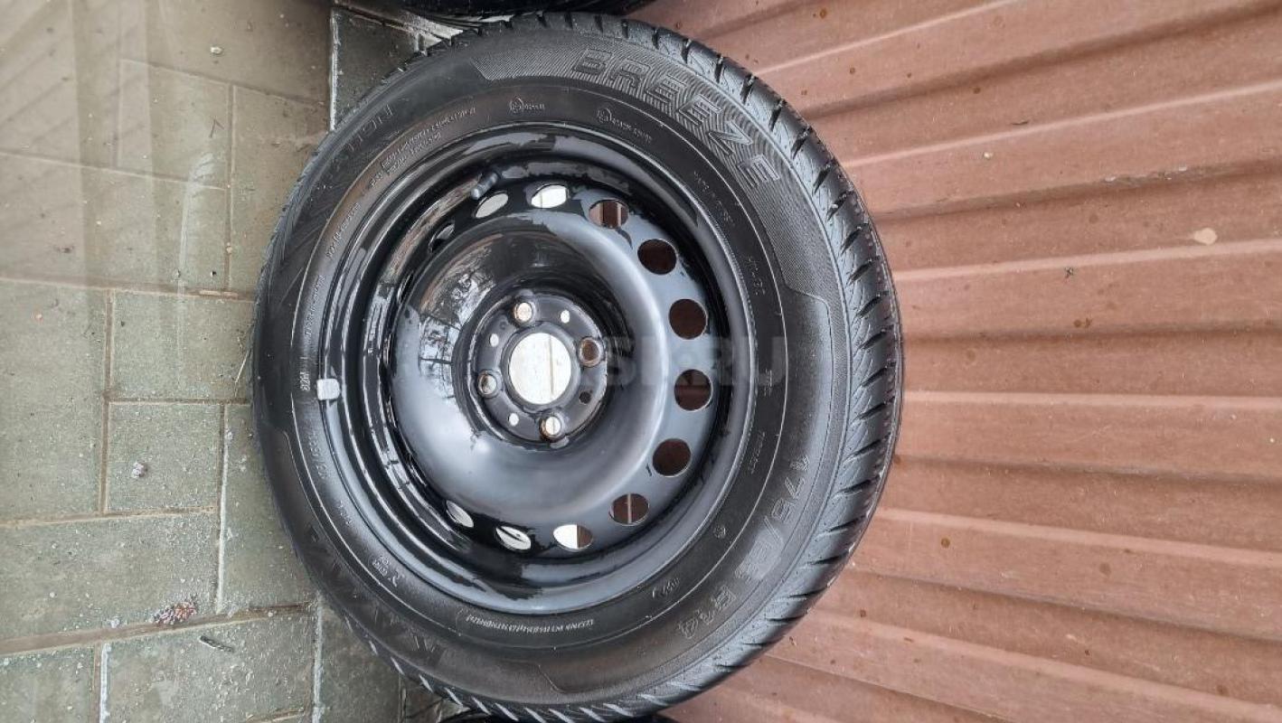 Продам новый комплект летних колес с резиной KAMA BREEZE 175/65R14. - Орск