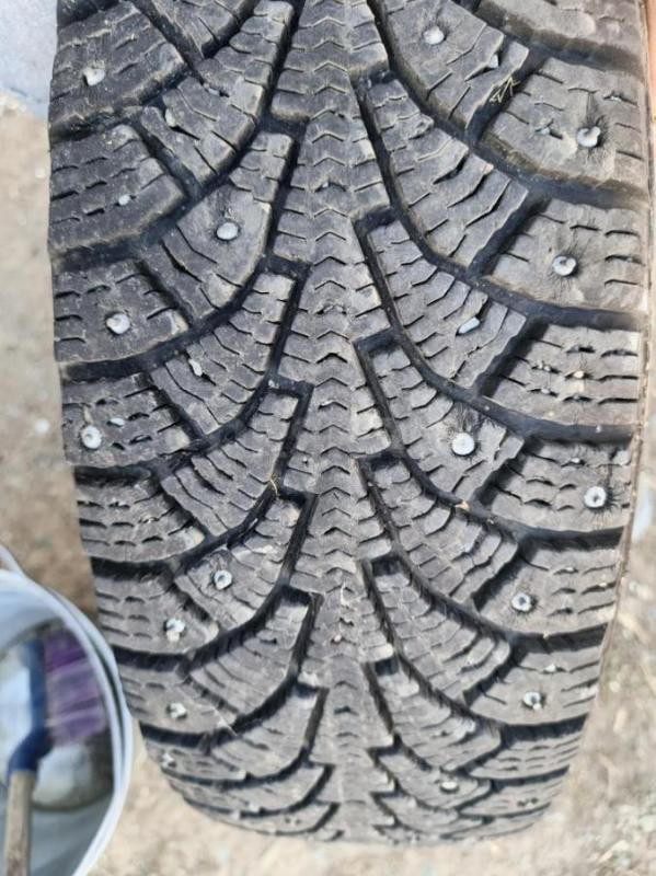 Продам зимнюю шипованную резину с дисками. 185/70.14R  Кама-евро. - Орск