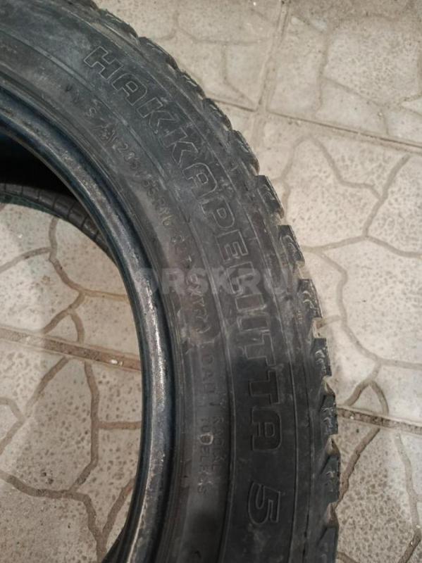 Продам б/у комплект зимних шипованных шин 205/55/r16: три баллона Нокиан Хакка 5, один Сайлун. - Орск