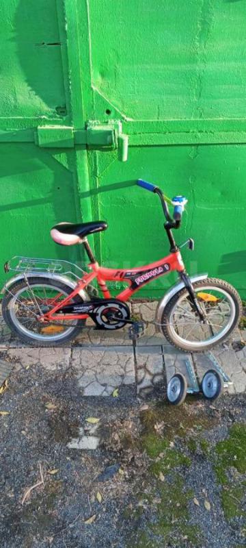 Продам детский велосипед в хорошем состоянии,колеса на 16+ дополнительные боковые колеса. - Орск