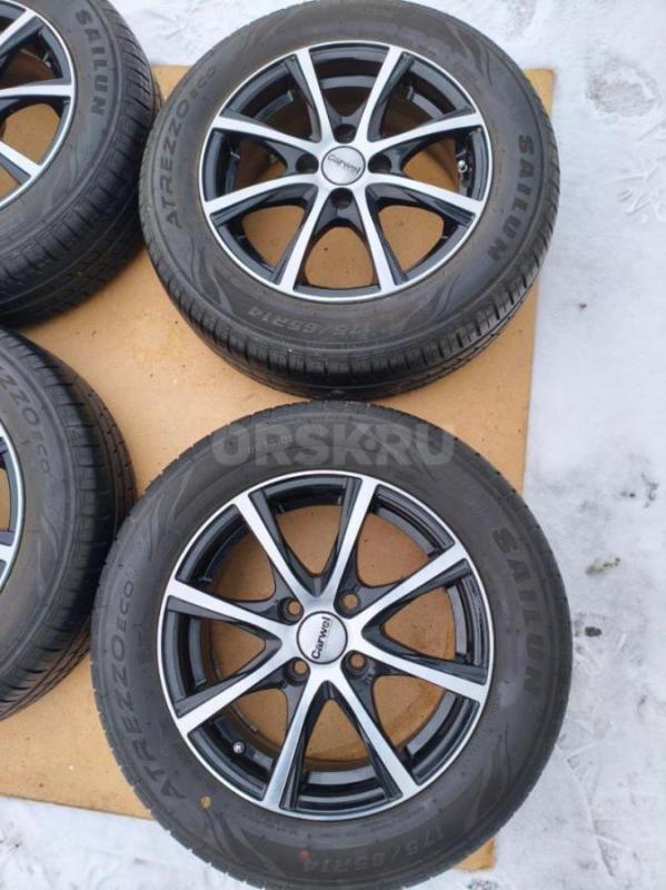 Продам комплект новой летней резине на новых литых дисках. - Орск