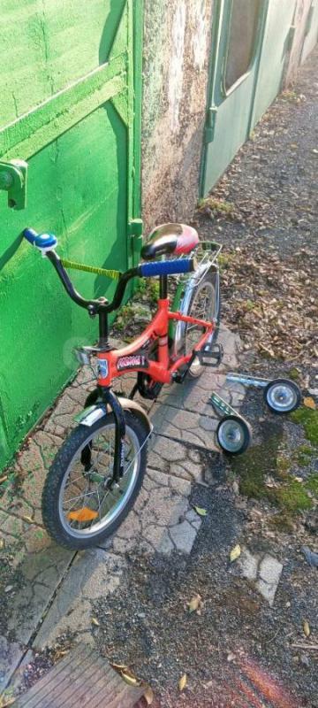 Продам детский велосипед, колеса на 16,покрышки практически новые, есть дополнительные боковые колес - Орск
