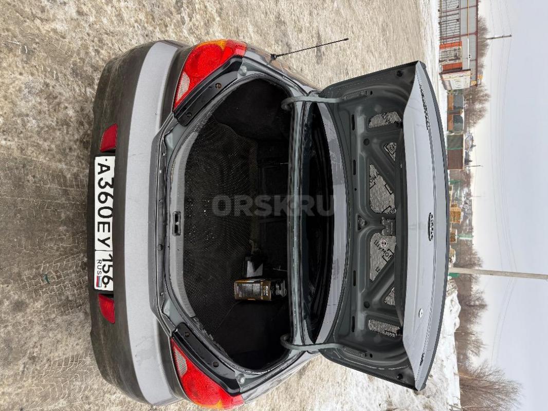 Продам Kia Spectra 2006 года, 2 комплекта колес, лето на дисках,Гур, кондиционер заправленный, обогр - Орск