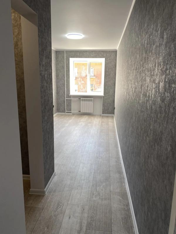 Продается 2х-комнатная квартира рядом с остановками "Строительный техникум"  и "Площа - Новотроицк